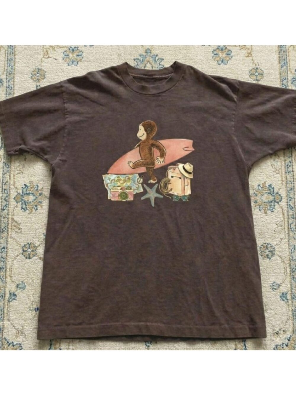 Brown Curious George surf monkey graphic t-shirt